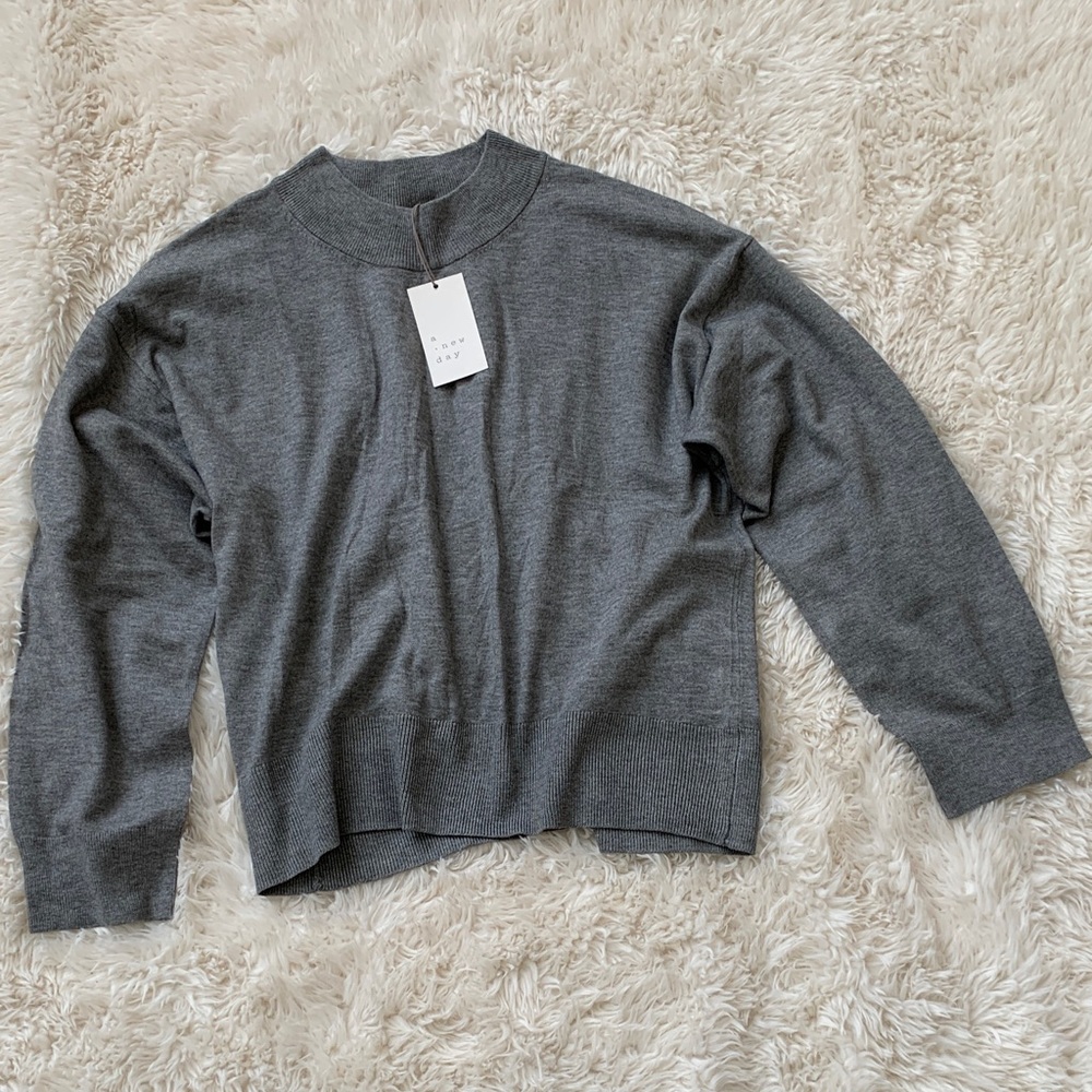 A new day sweater size S